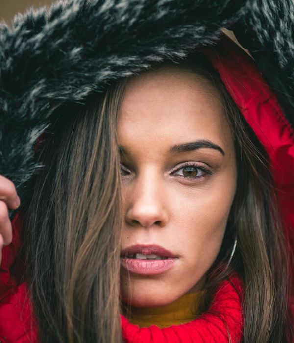 Woman with closed eyes looking calm and relaxed.